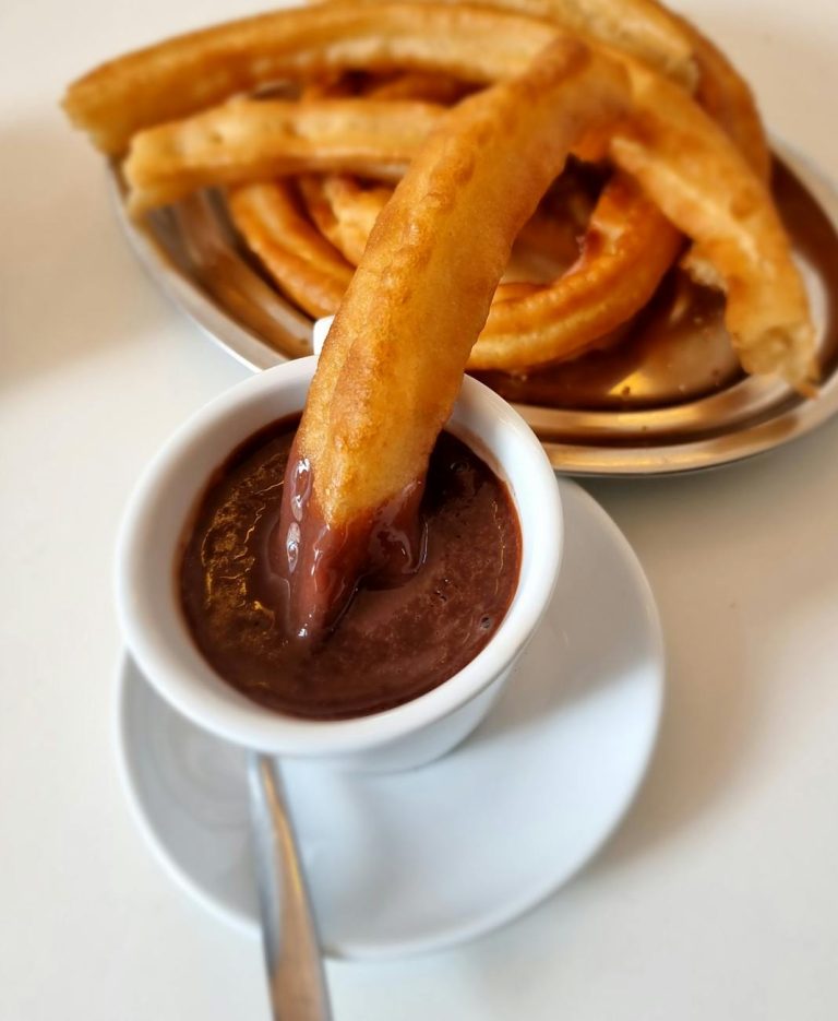 Enjoy these perfectly golden churros with a decadent chocolate dip, a classic Spanish treat.